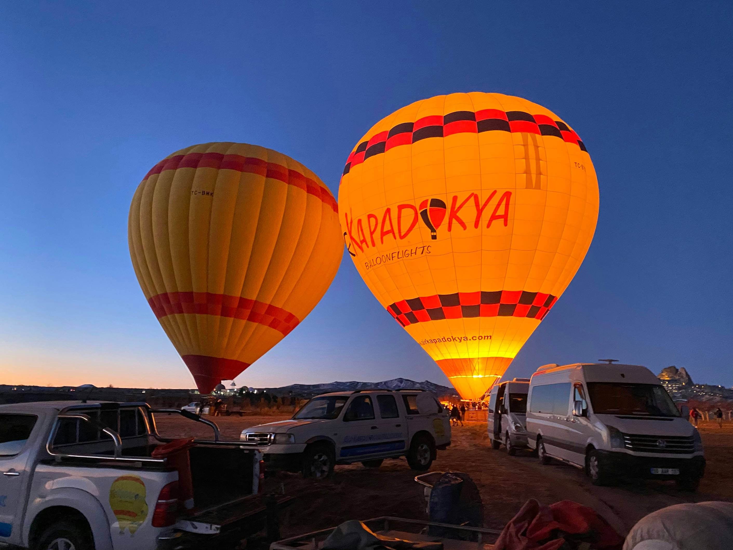 a group of hot air balloons in the sky