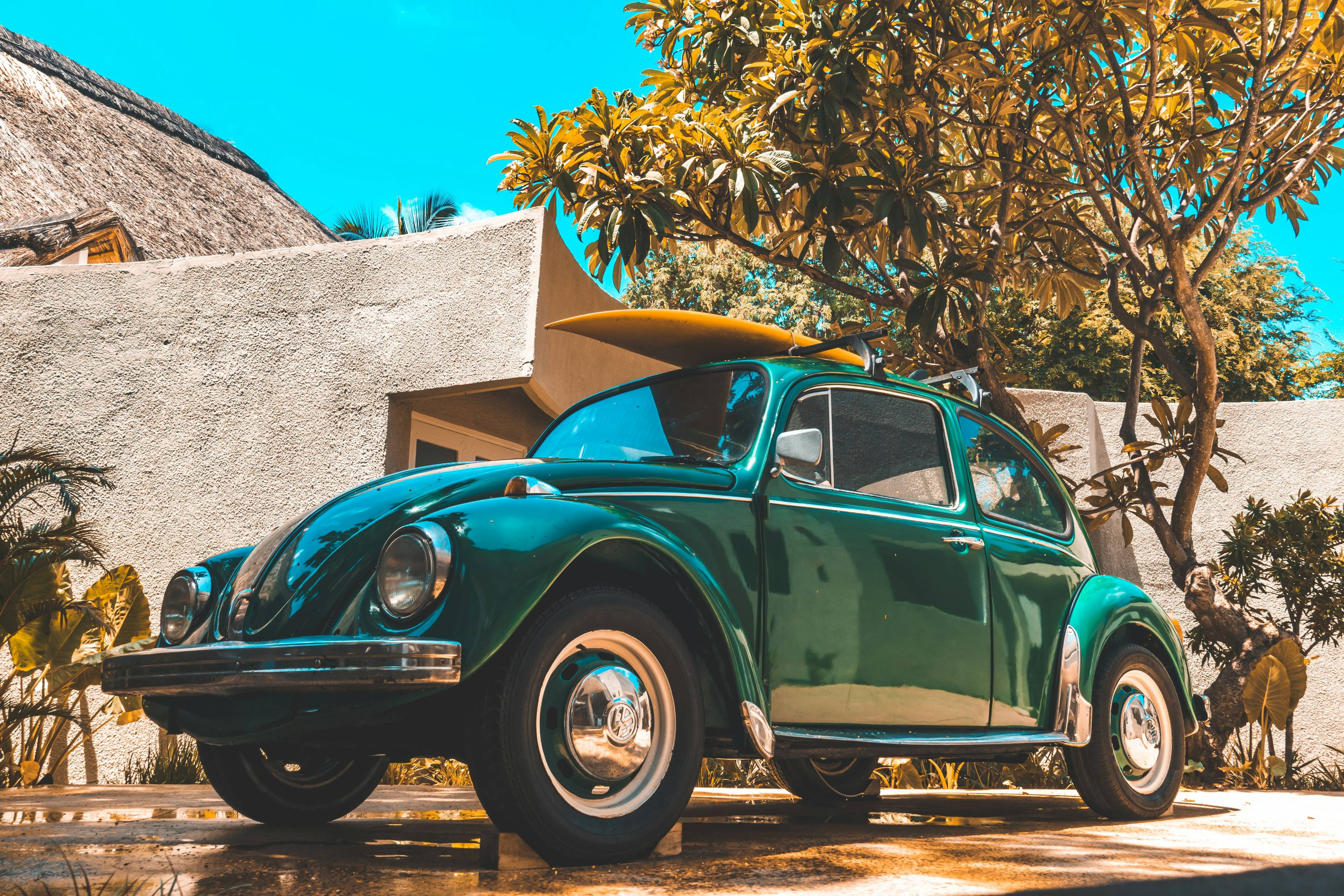 parked blue Volkswagen coupe