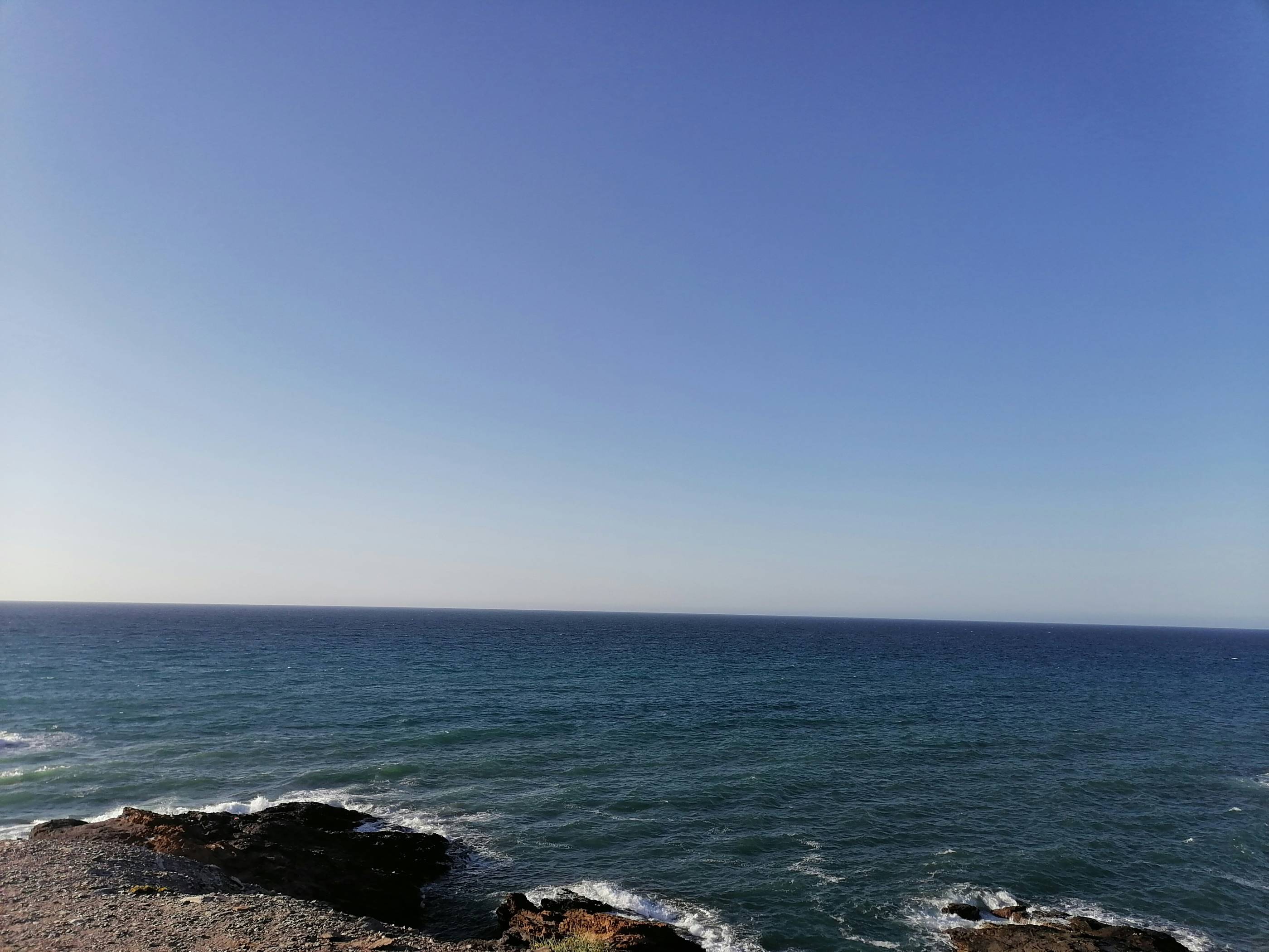 A view of a body of water from a cliff