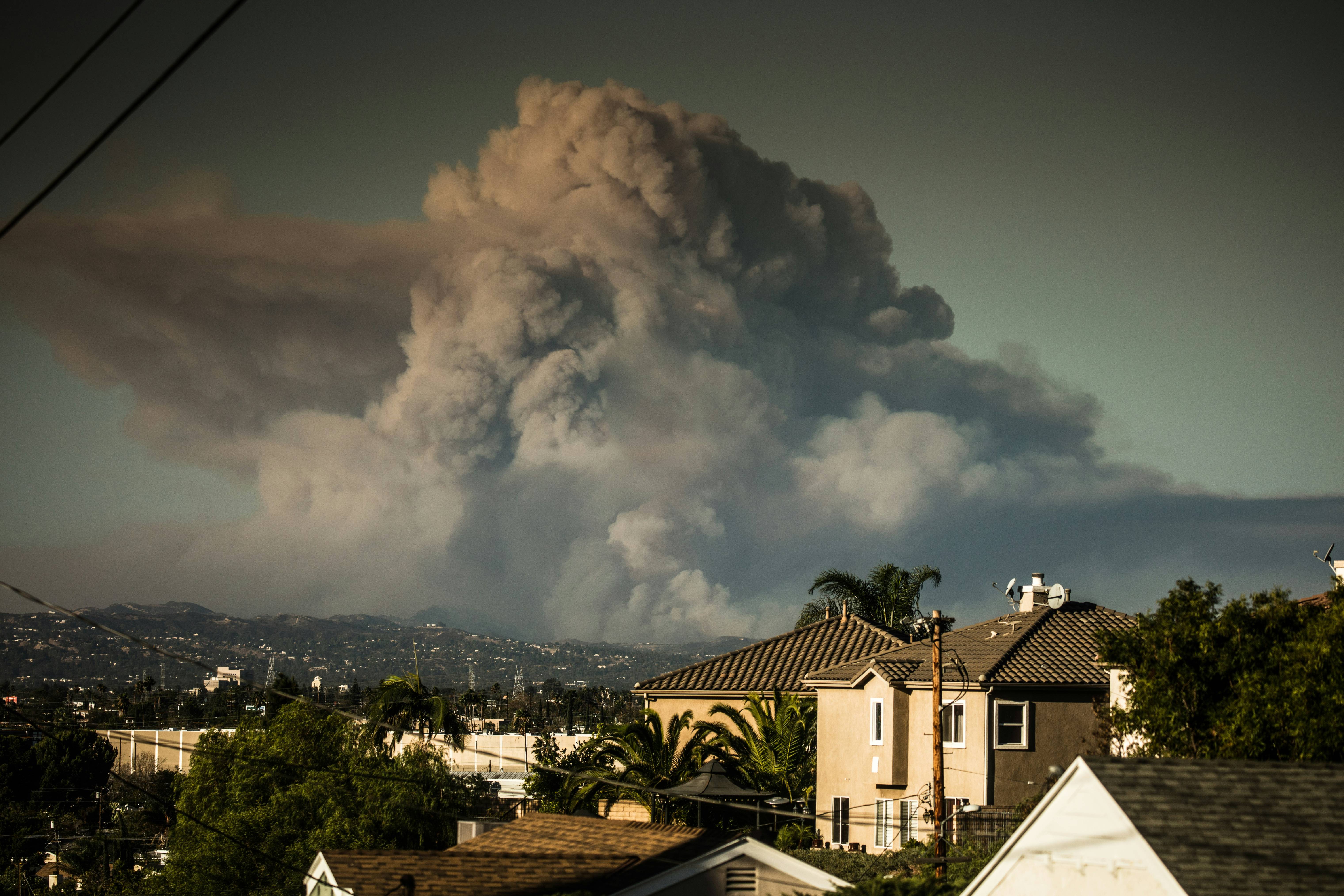a large storm cloud over a city